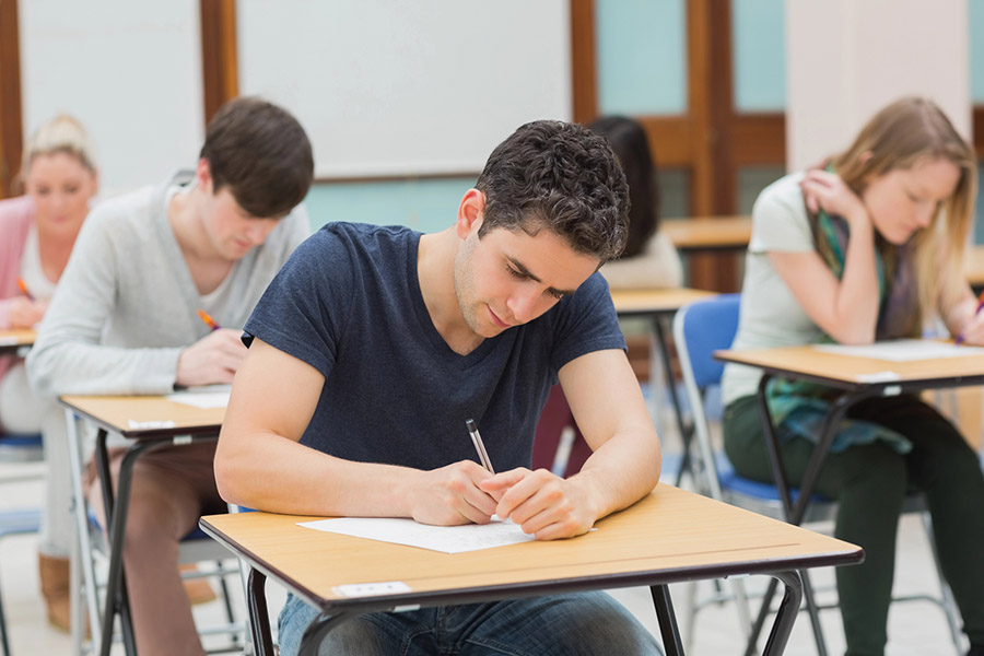 Students taking a test in a classroom in Arlington